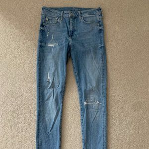 High waisted distressed light wash slim jeans